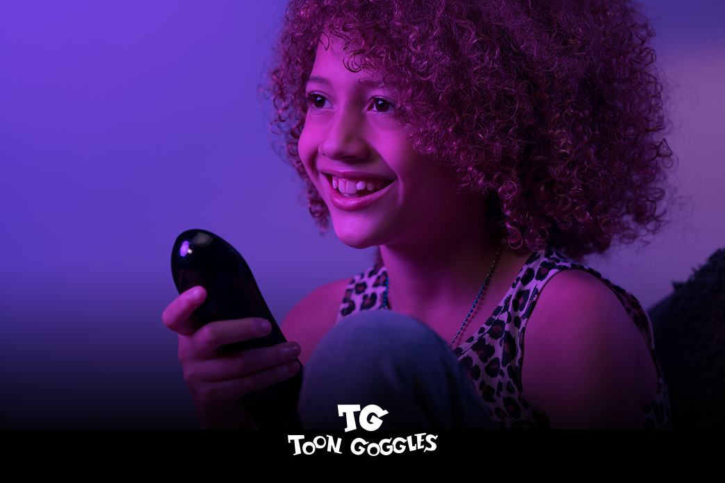 girl holding up remote