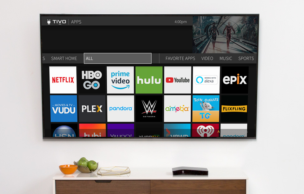 TV in a living room displaying TiVo BOLT OTA home screen